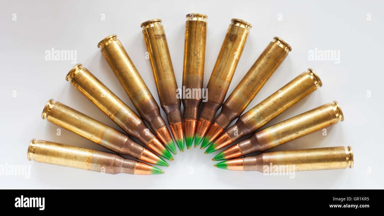 Rifle ammunition with bullets that have a green tip in a semi circle on ...
