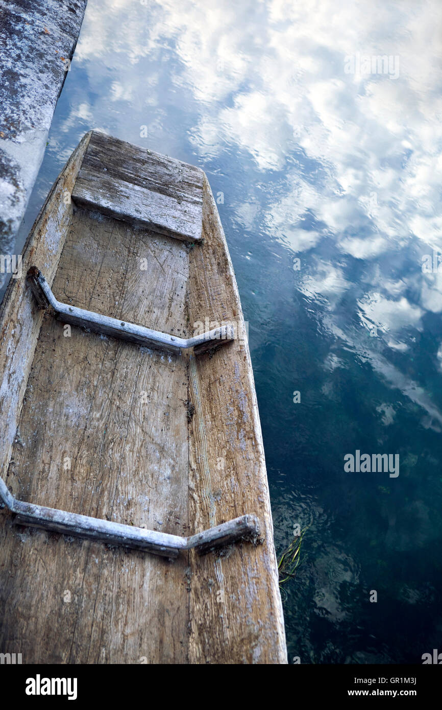 Old wooden fishing boat on a small French river Stock Photo - Alamy