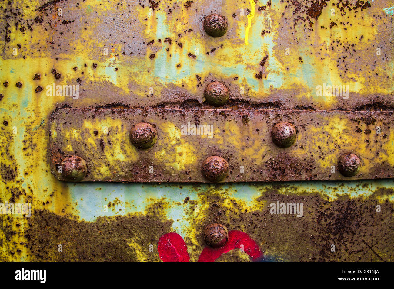 Rusty Corroded Details On Painted Steel Door Stock Photo