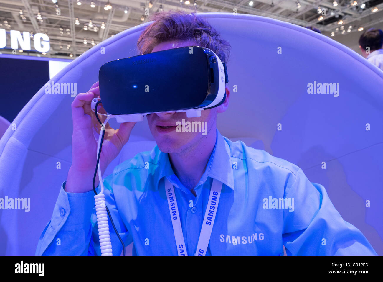 Samsung Virtual Reality (VR) headset being demonstrated to visitor at 2016  IFA (Internationale Funkausstellung Berlin), Berlin, Stock Photo