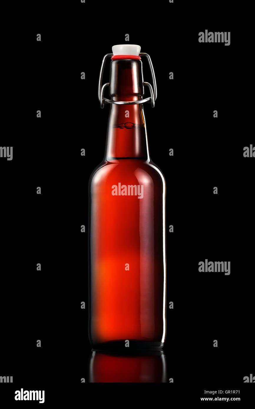 Swing top bottle of light beer with clipping path isolated on black