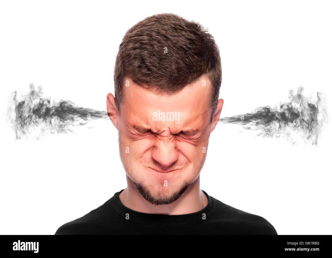 Angry man with smoke or fume coming out from his ears on white background. Stock Photo