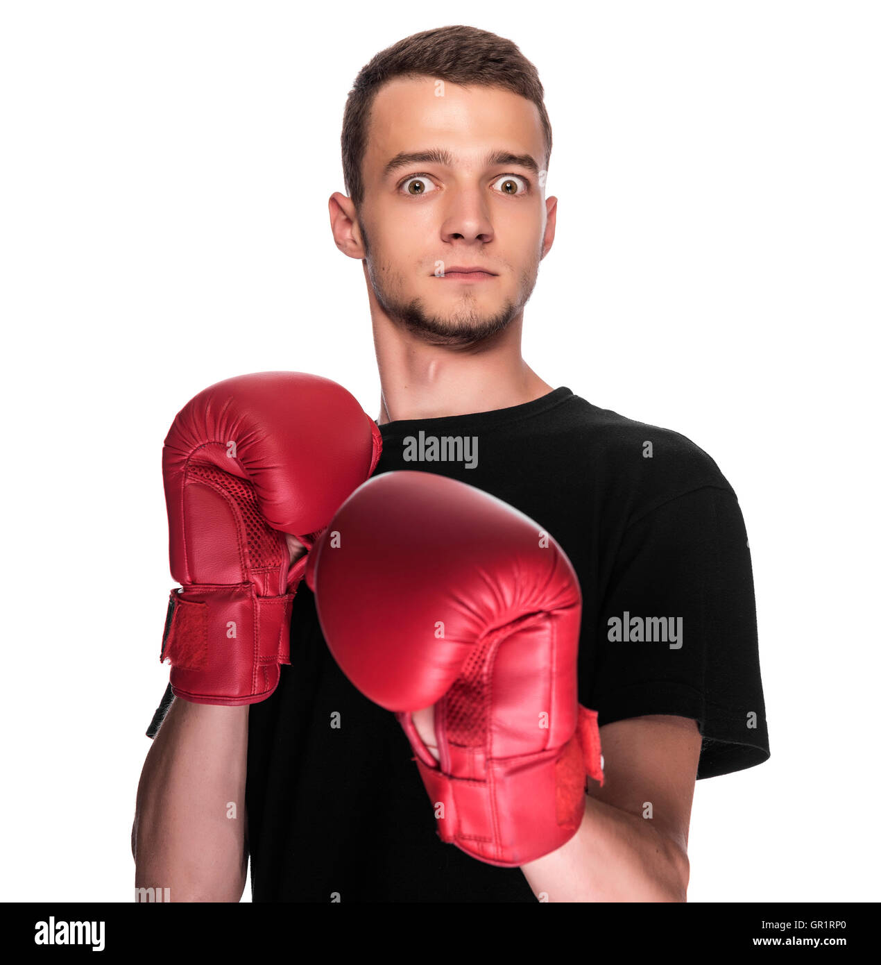 Cowardly funny young man in red boxing gloves Stock Photo Alamy