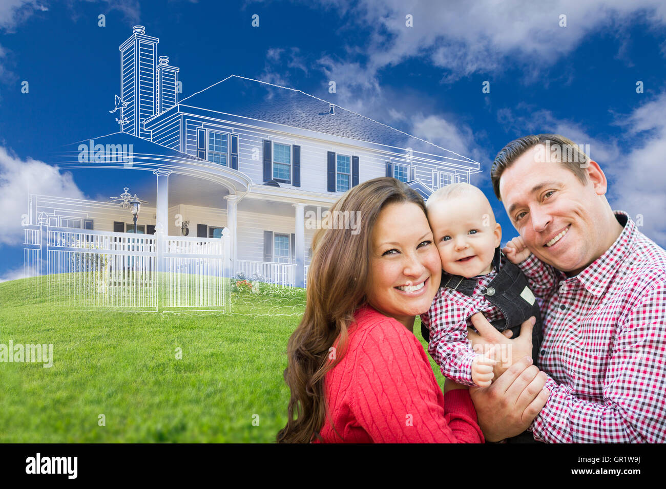 Happy Family with Ghosted House Drawing and Rolling Green Hills Behind. Stock Photo