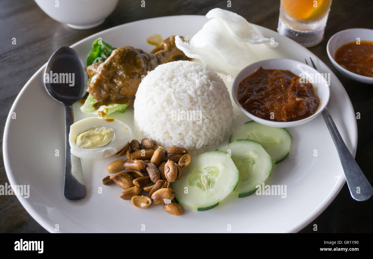 Nasi lemak served in the restaurant, famous Malaysia dish Stock 