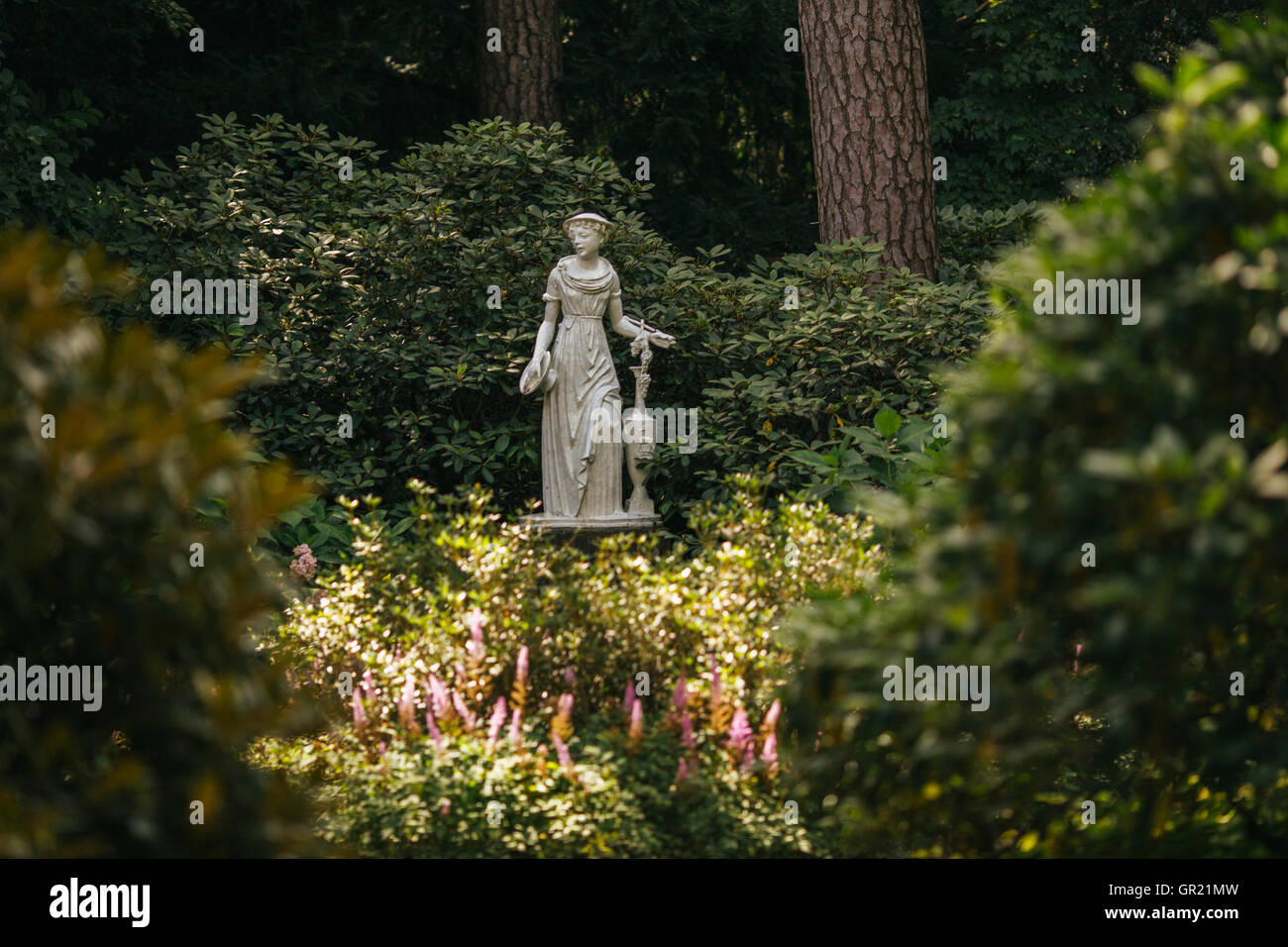 Statue in the garden Stock Photo Alamy