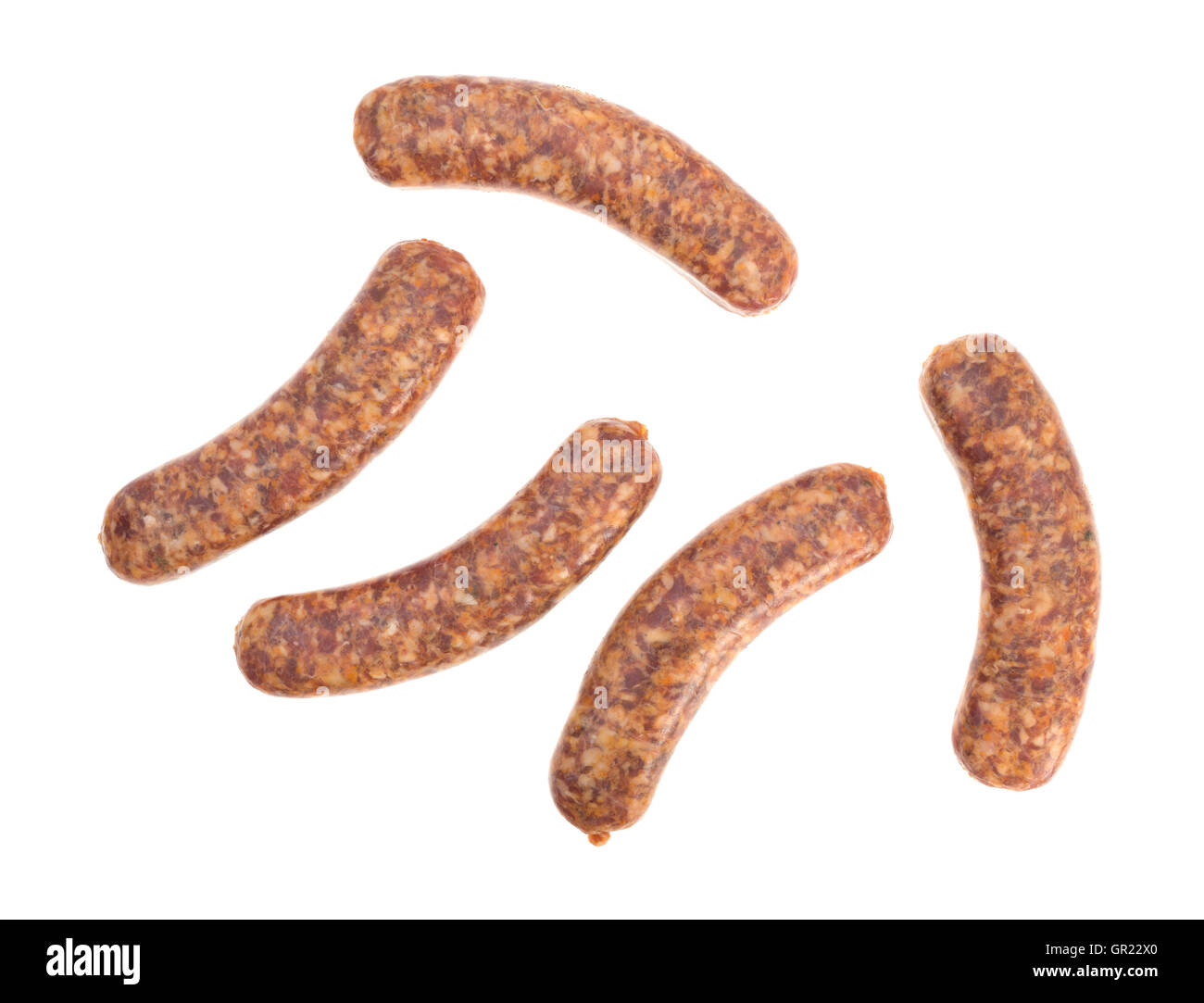 Top view of several spicy bratwurst links on a white background. Stock Photo