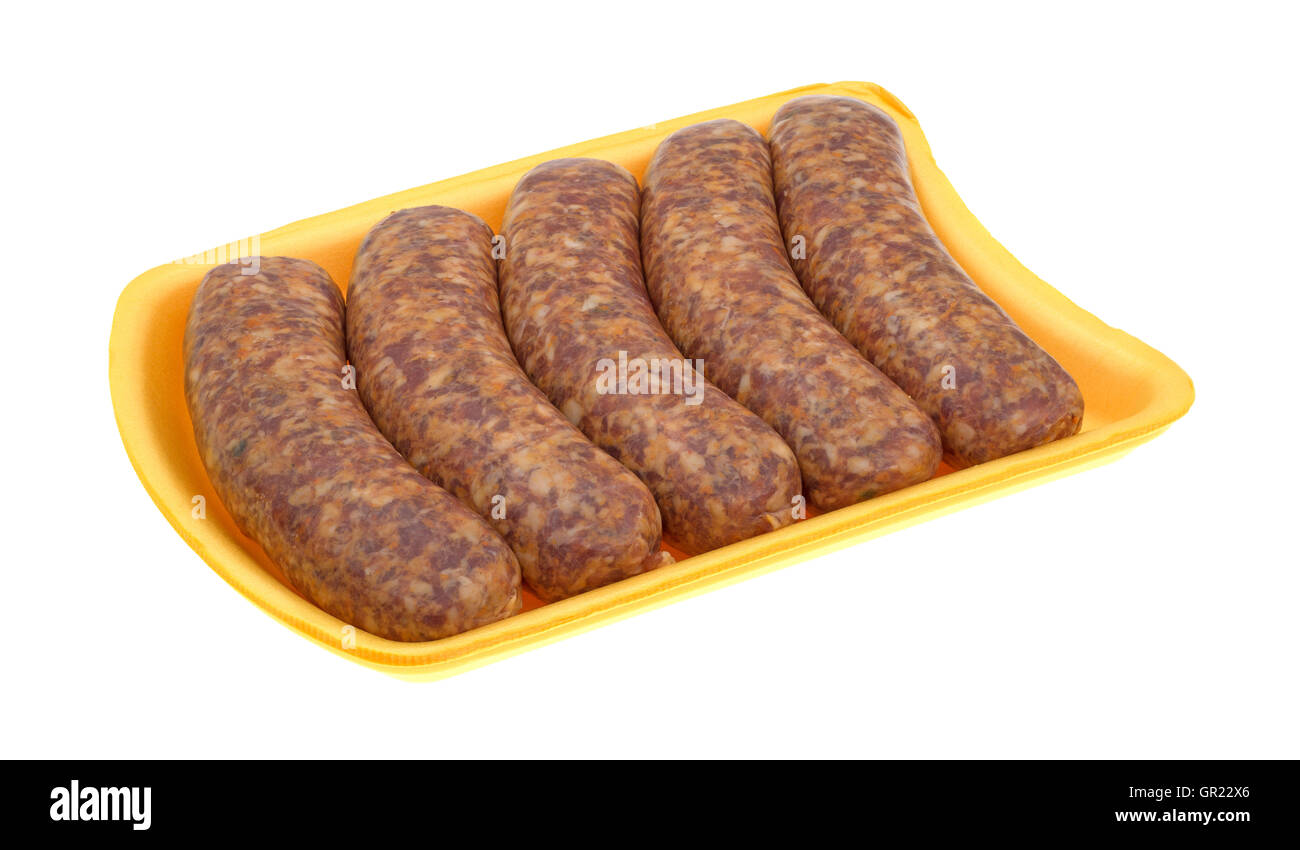 Spicy bratwurst links on a yellow foam butcher tray atop a white background. Stock Photo