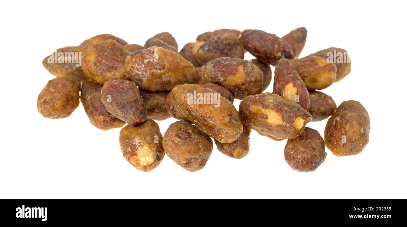 A portion of honey glazed almonds on a white background Stock Photo - Alamy