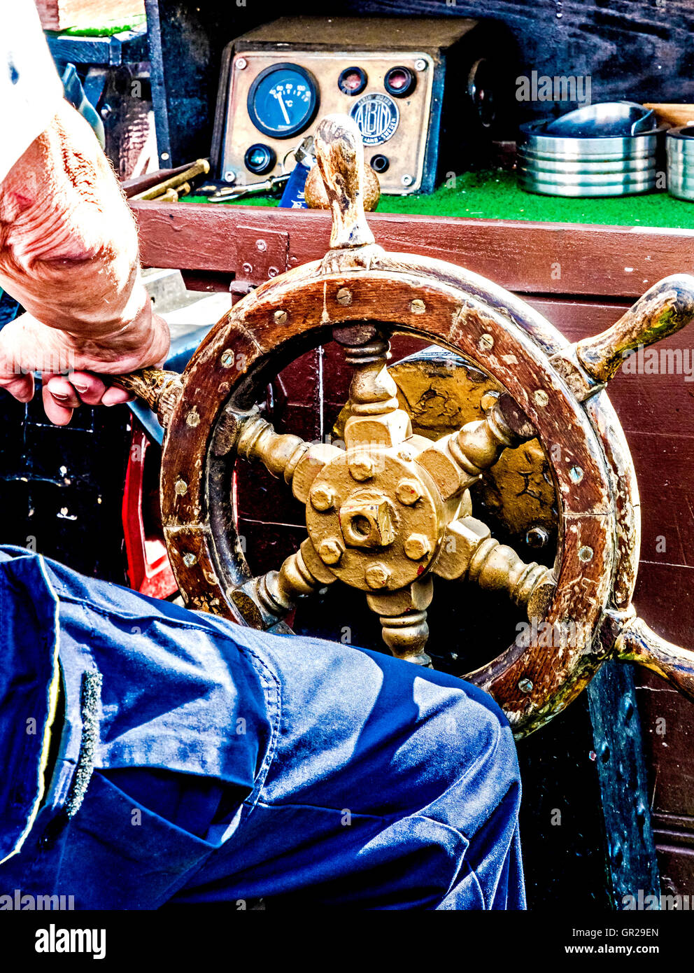 Steering wheel on a small ship, steuerrad eines kleinen schiffes Stock Photo
