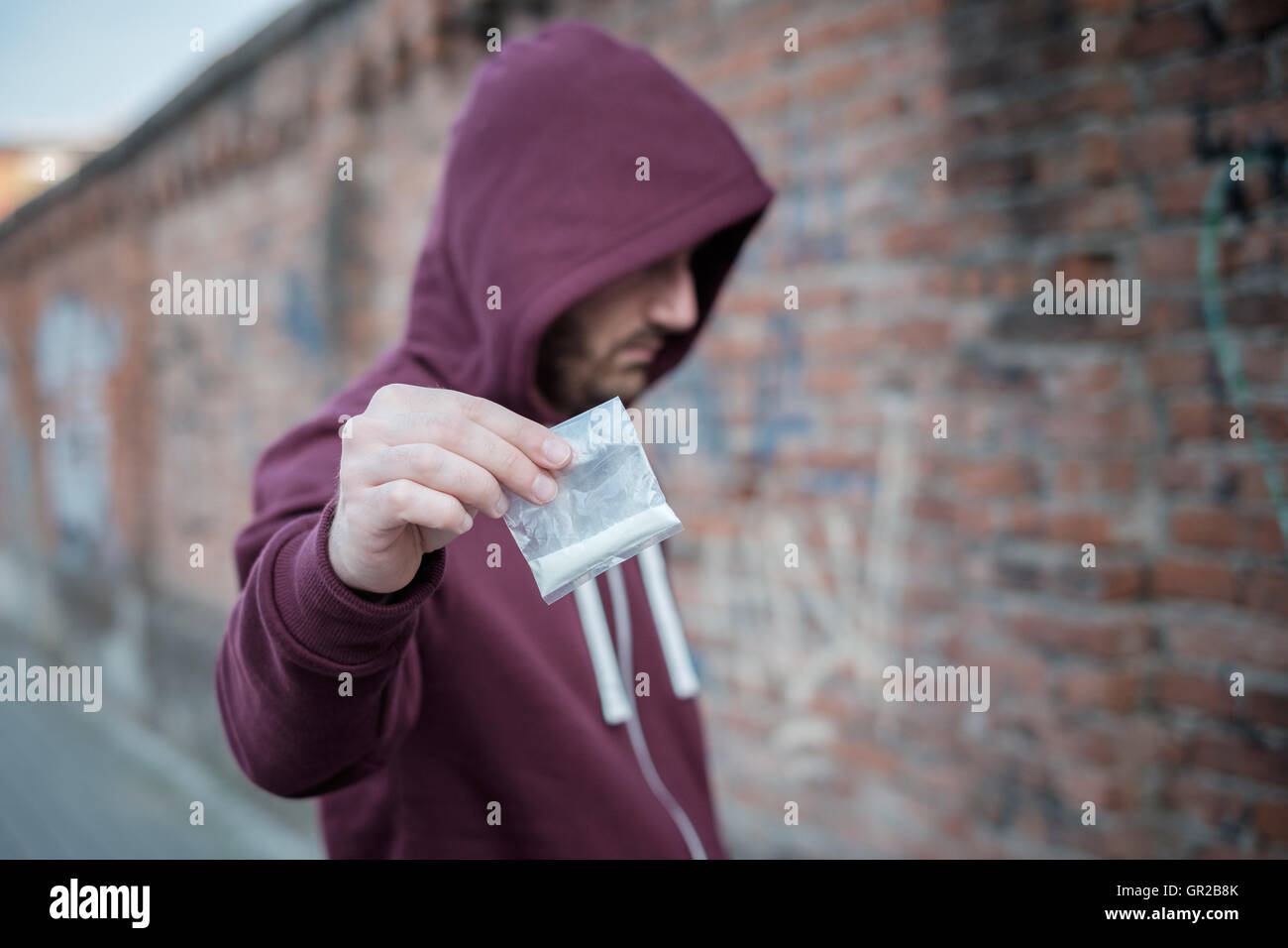 Pusher selling trafficking drug dose hires stock photography and