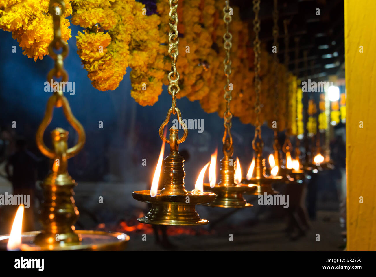 Lamps on the side of the temple, near Kannur, Kerala, India Stock Photo