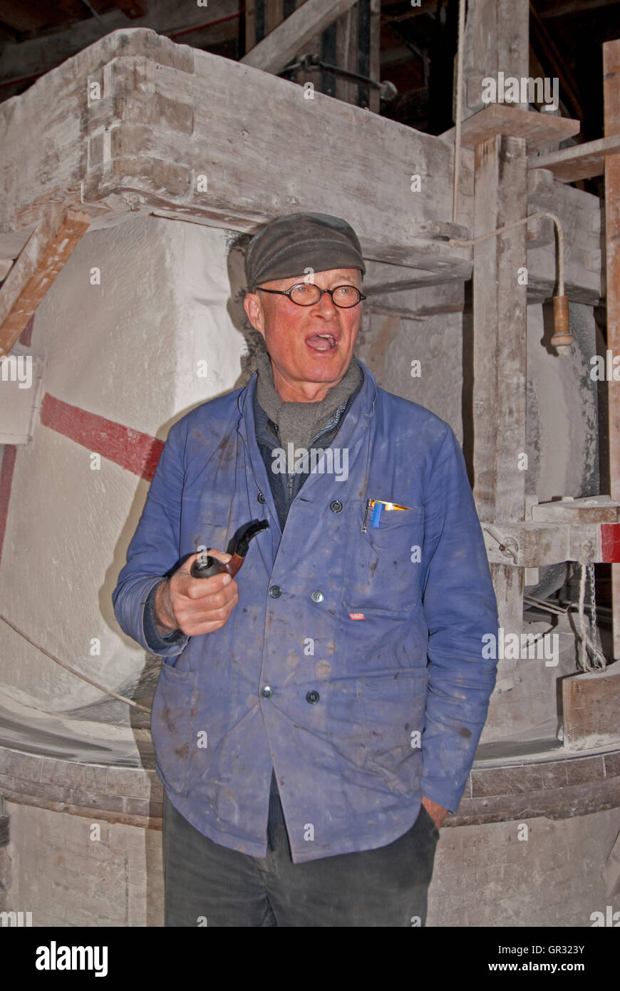 Guide and interpreter, Piel Kempenaar, provides information at De Kat Windmill Stock Photo