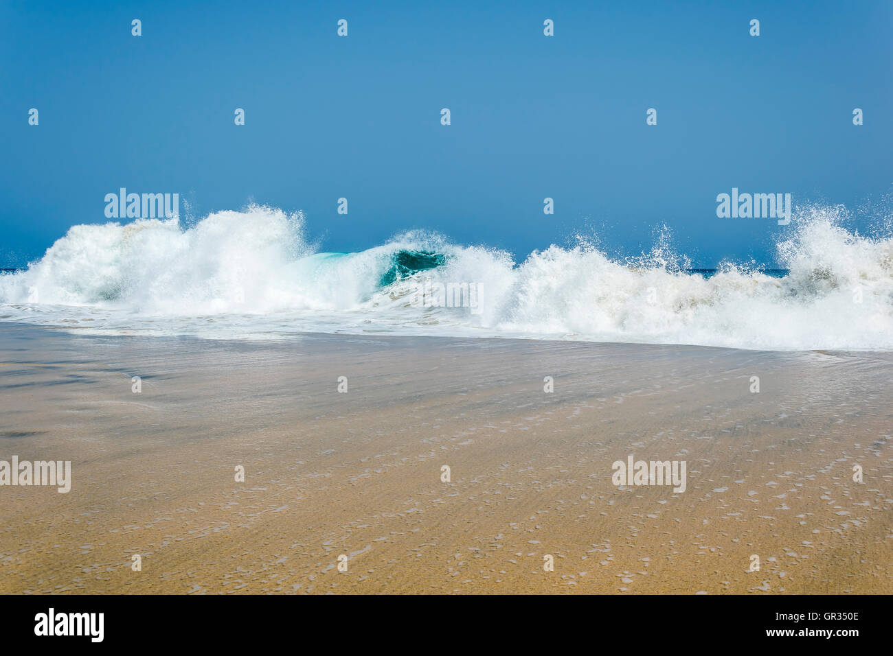 Big tide waves on beach hi-res stock photography and images - Alamy