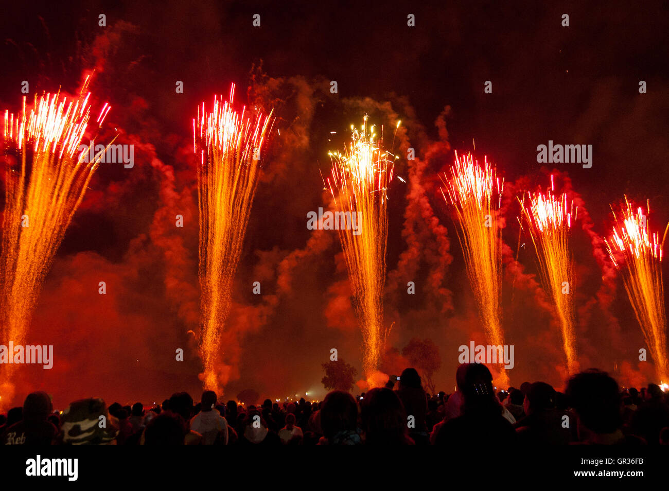 Crowd watching a fireworks show during the National Pyrotechnic