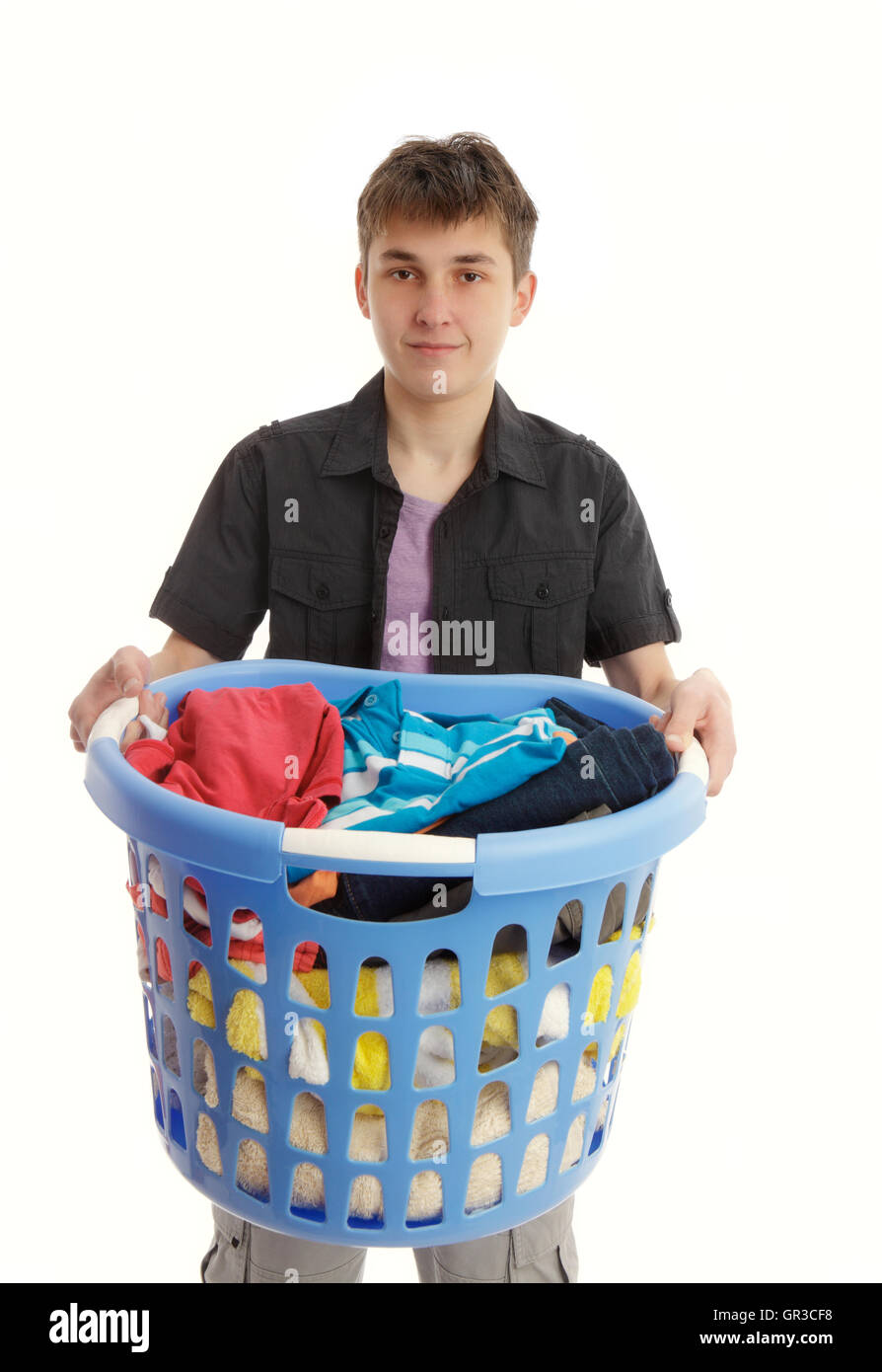 Teenager with laundry basket Stock Photo Alamy