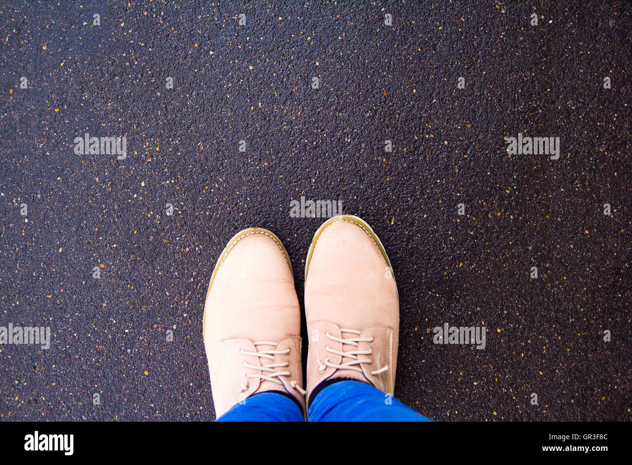 brown shoes on wet pavement, top view Stock Photo Alamy