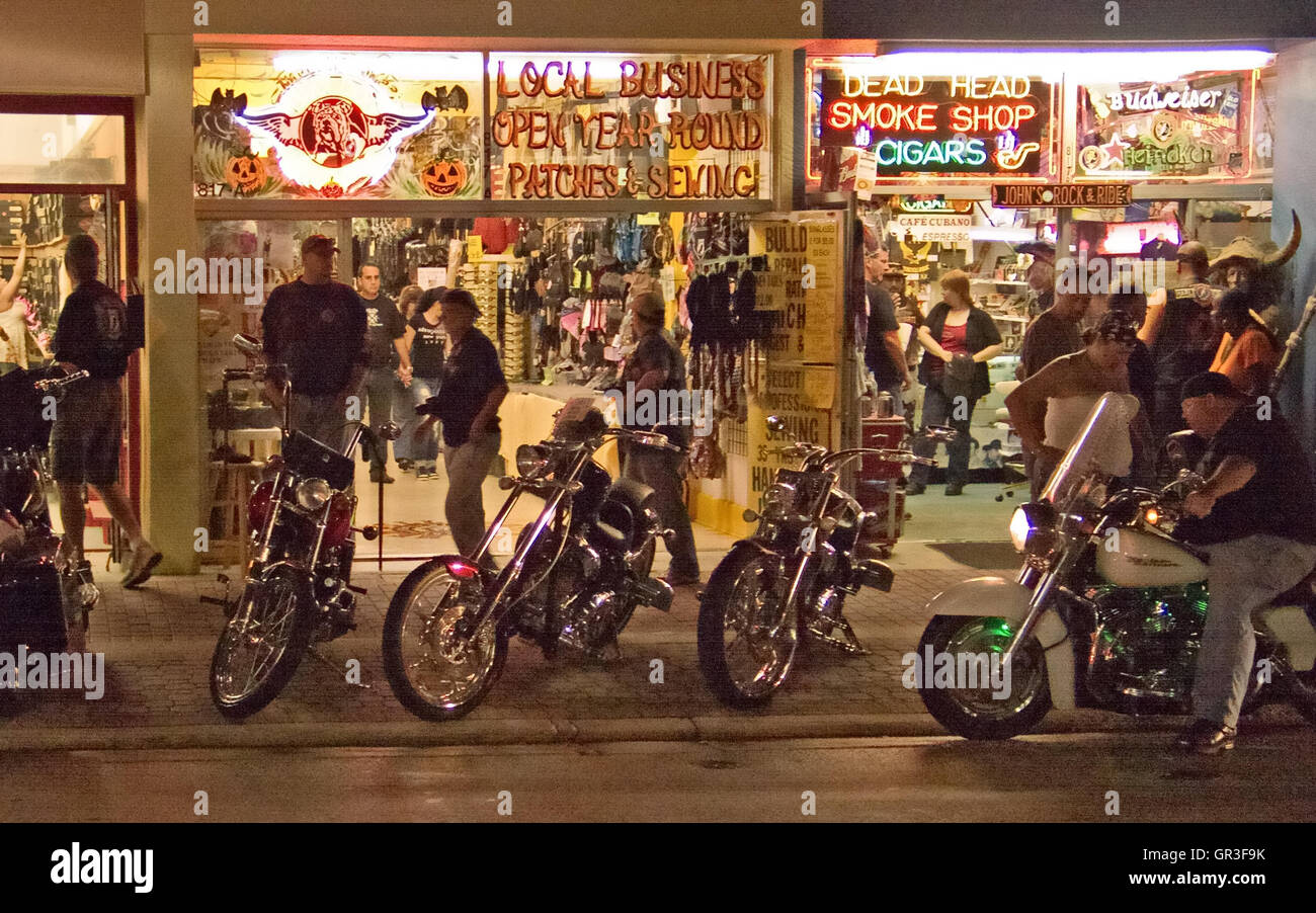 Biketoberfest in Daytona Beach, Florida, is an annual event that occurs in October.  Festivities can run well into the evening. Stock Photo