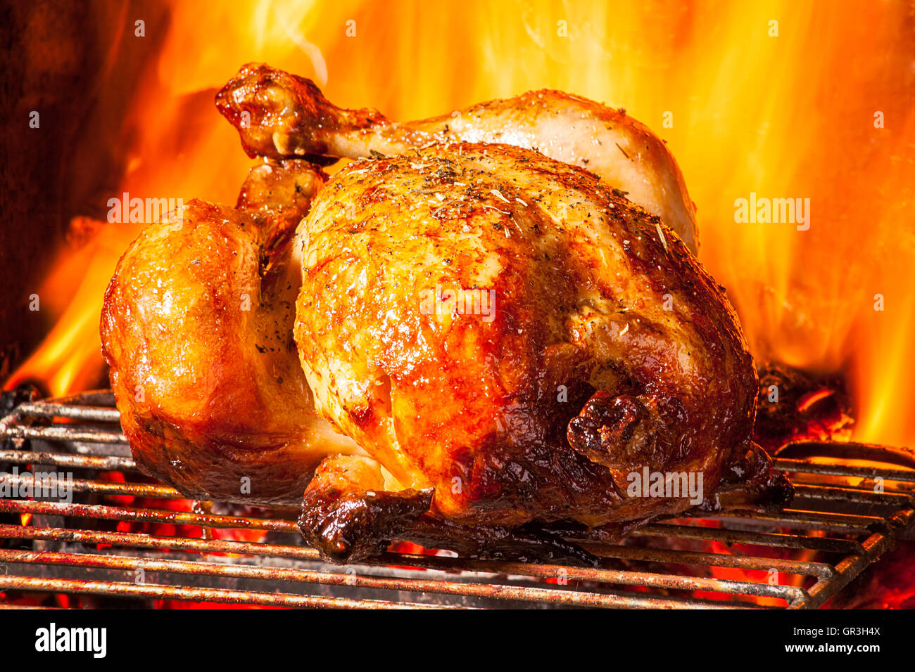 Roast Chicken in front of fire Stock Photo Alamy