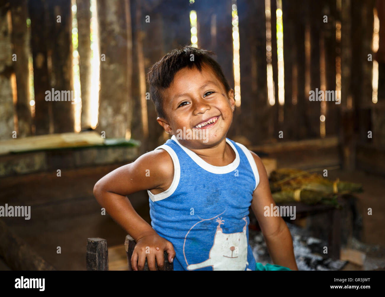 Young local native boy in the Pilchi Community on the Napo River (an Amazon tributary), Ecuador, South America, smiling Stock Photo