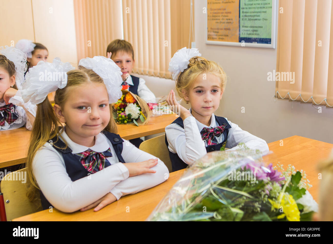 Russian schoolgirl in uniform first hires stock photography and images