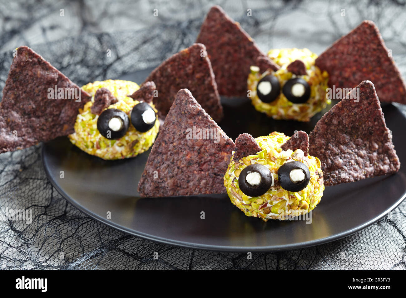 Cute bat cheese ball for Halloween party Stock Photo