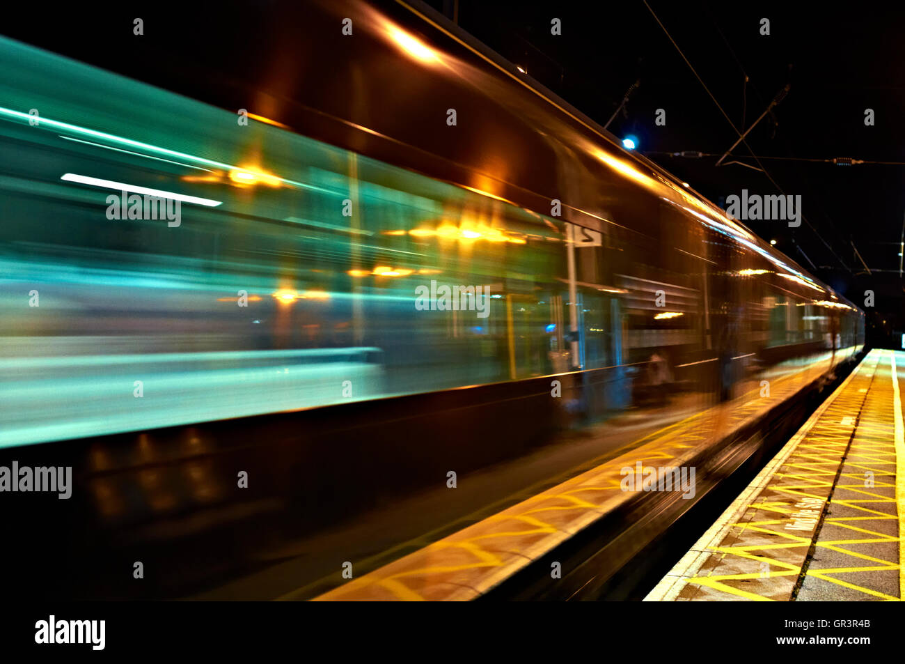 Train in motion - night photography Stock Photo