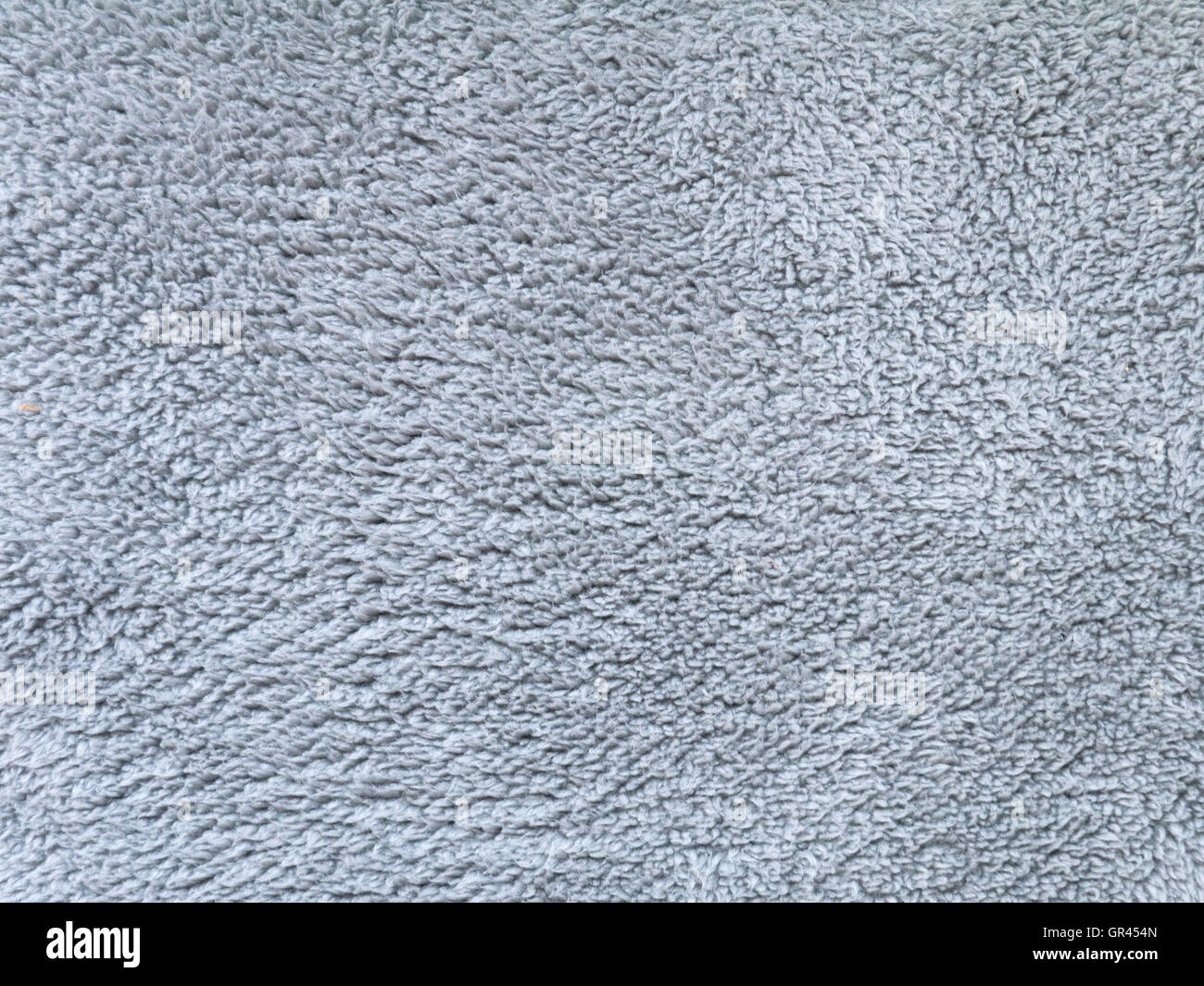 Light gray fluffy polyester fleece fabric background Stock Photo