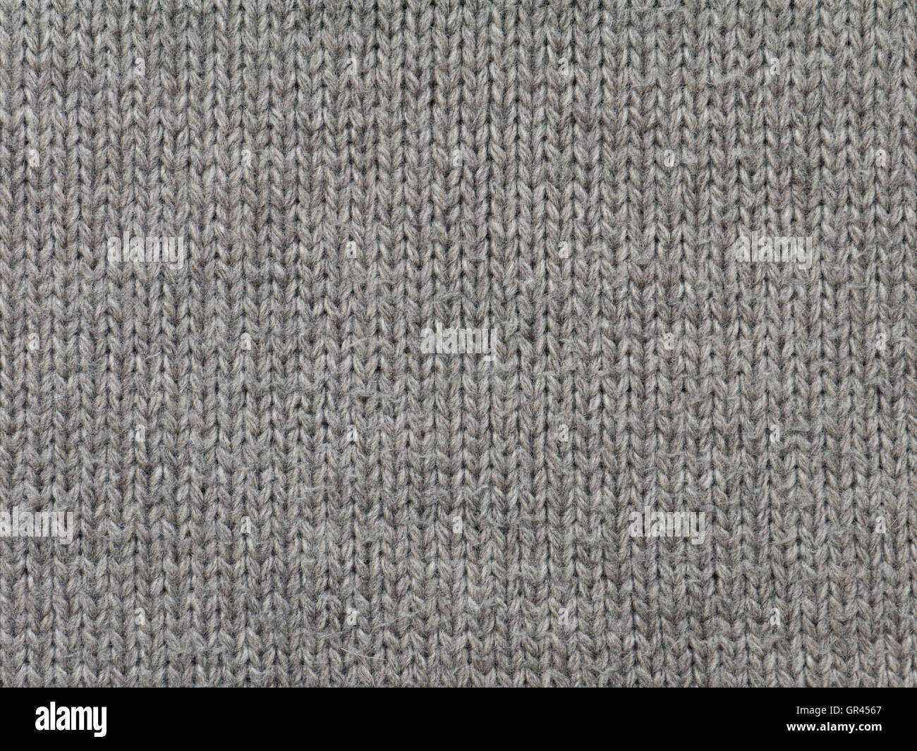 Dark brown knitted wool fabric cool weather background Stock Photo
