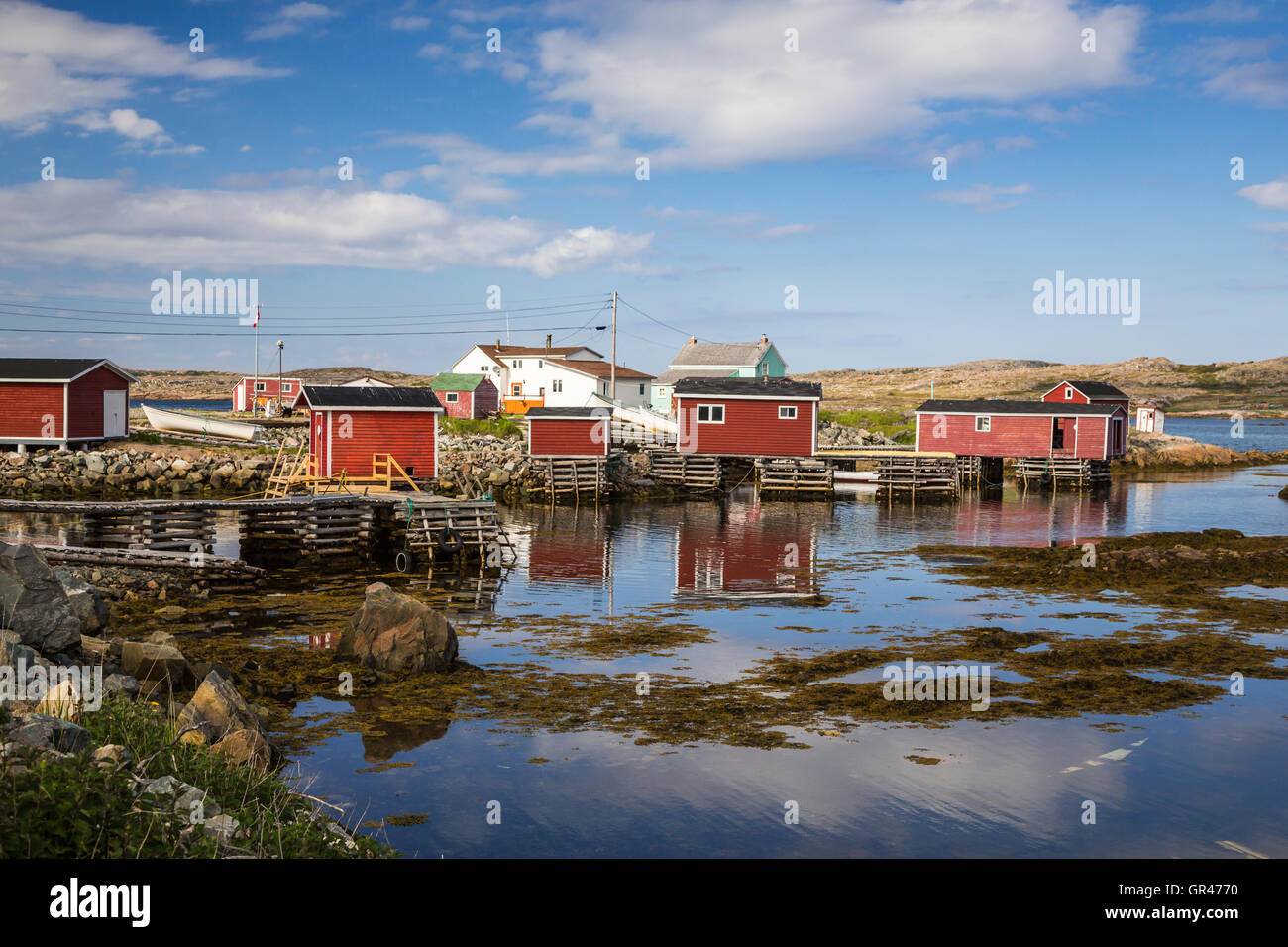 Fishing boats and stages in the harbor at Joe Batt's Arm-Barr'd Islands ...