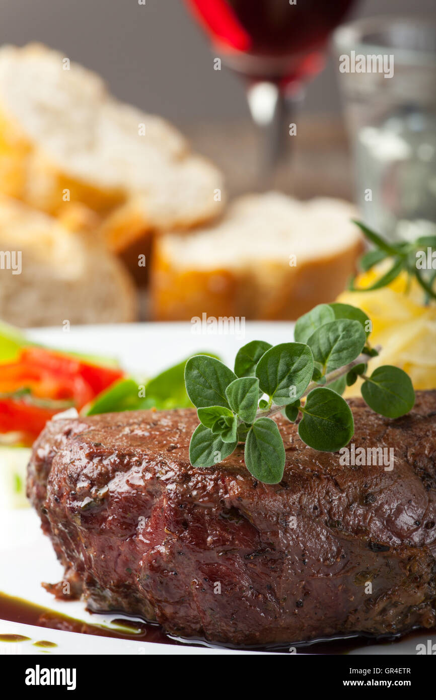 grilled steak with oregano Stock Photo Alamy