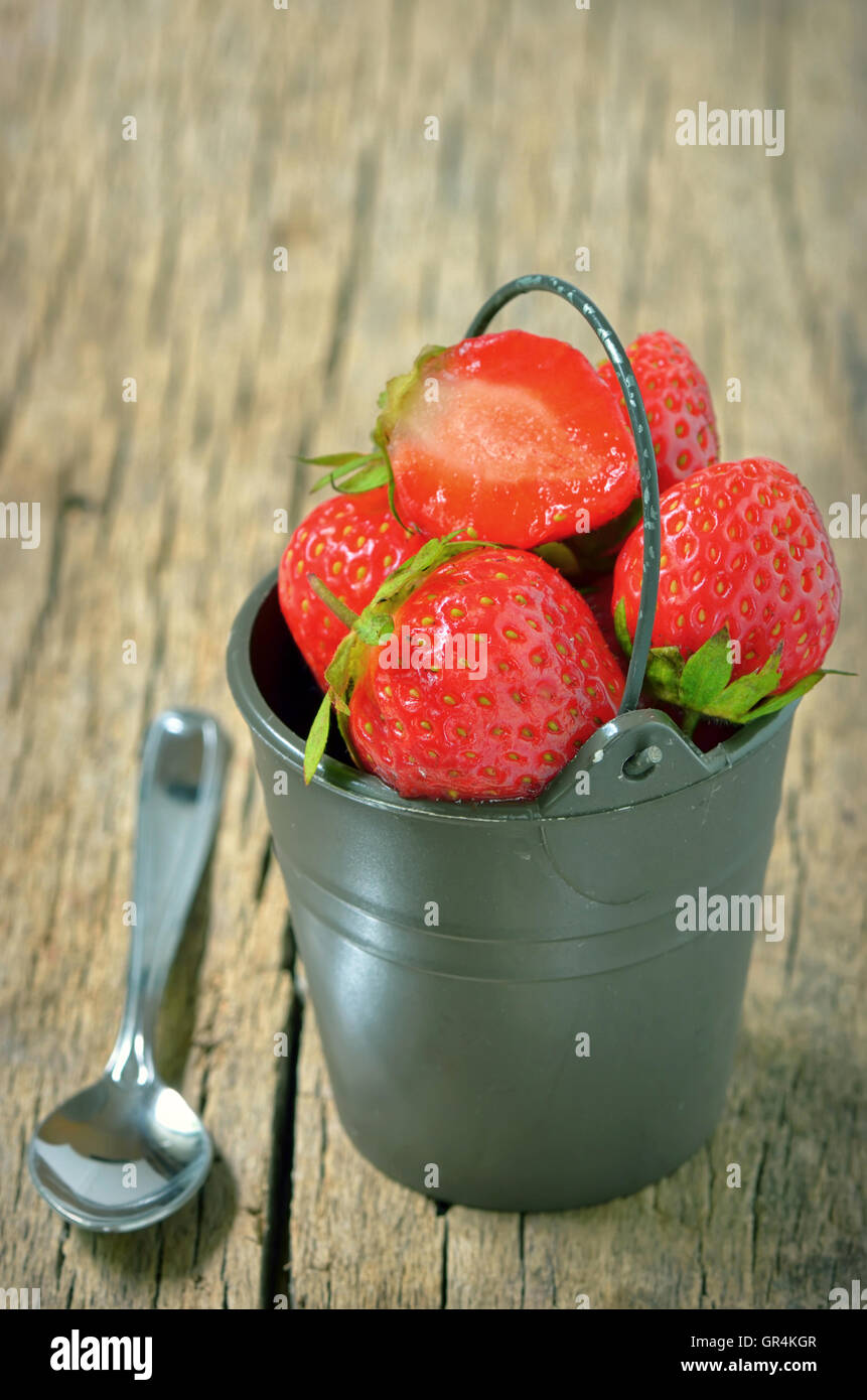 Fresh strawberries in bucke Stock Photo - Alamy