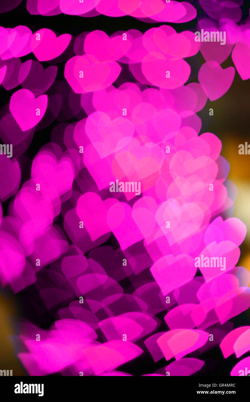 pink hearts bokeh as background Stock Photo - Alamy