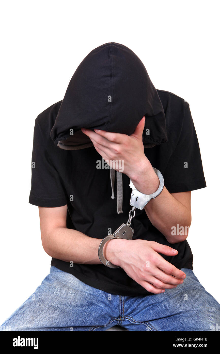 Young Man in Handcuffs Stock Photo - Alamy