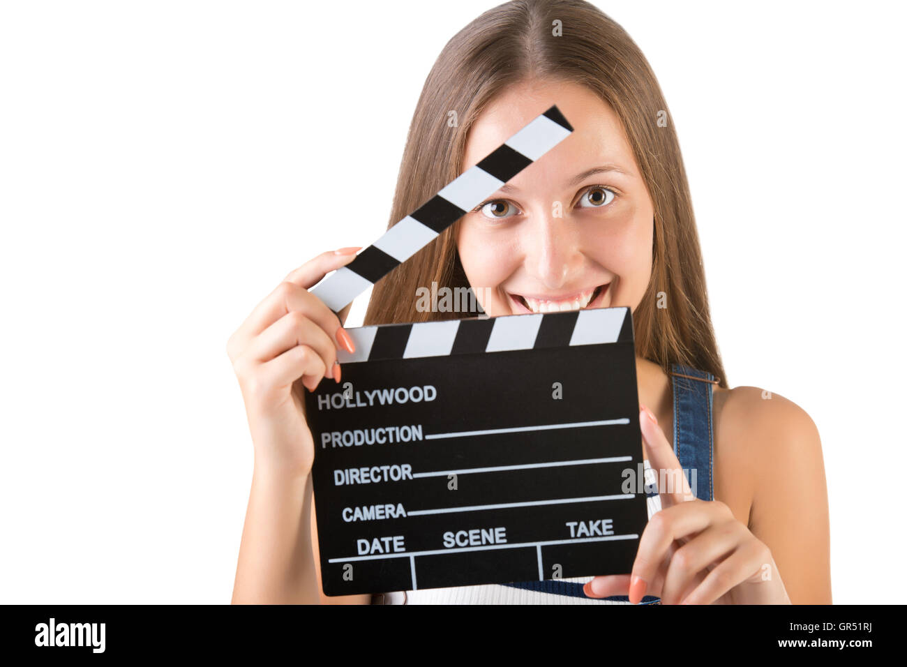 Woman holding a clapperboard, isolated in white Stock Photo