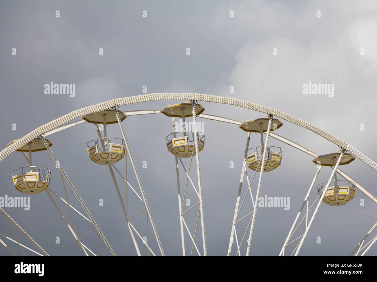 Ferrys Wheel in front of grey sky Stock Photo