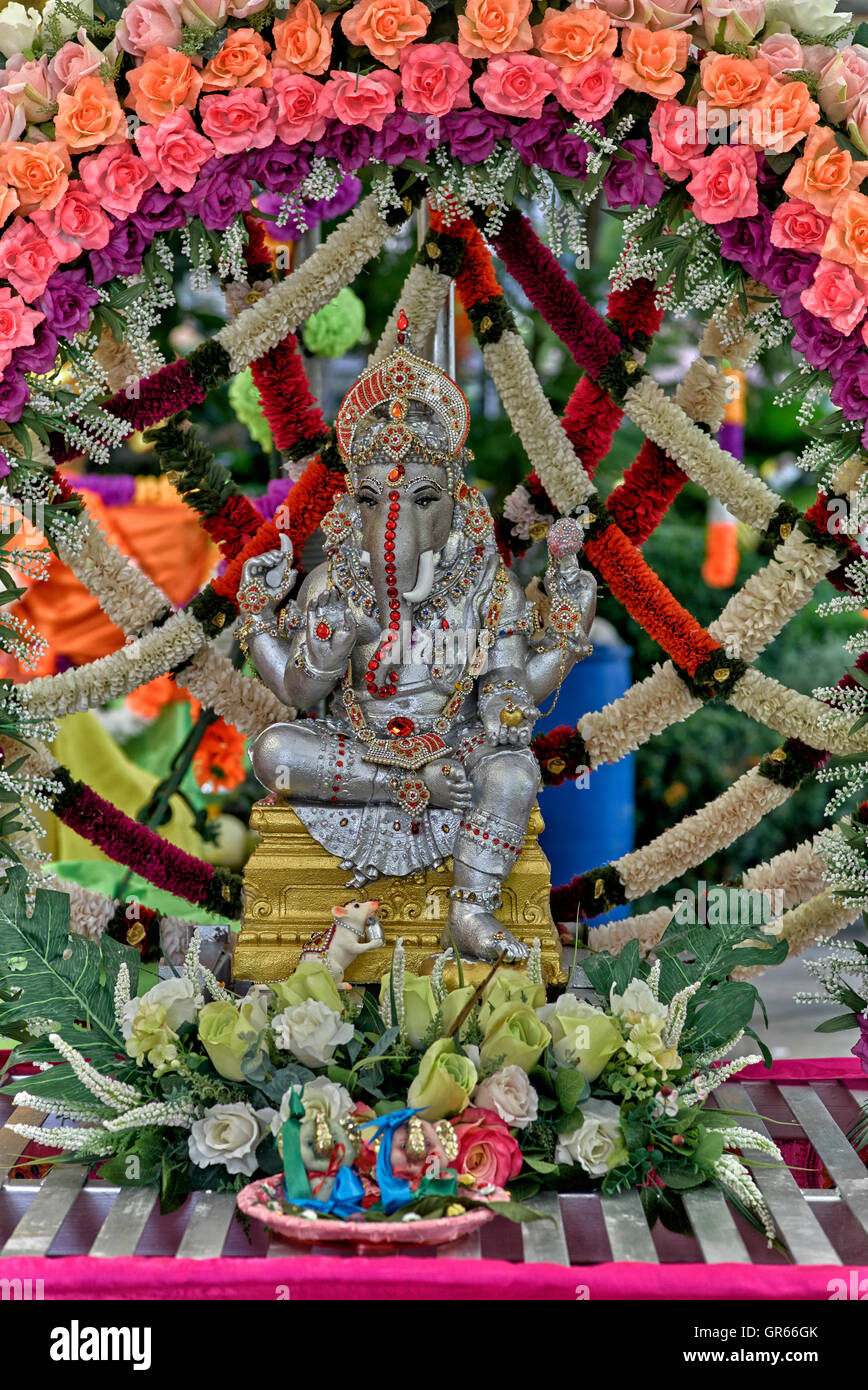 Statue Of Ganesh The Hindu God Decorated With Flowers At A Thai