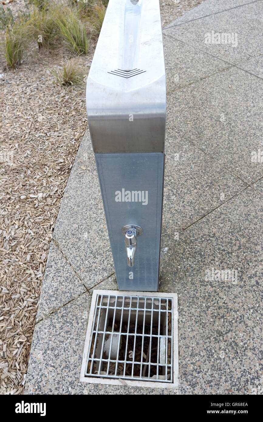 Stainless Steel water tap at a park in Melbourne Australia Stock Photo