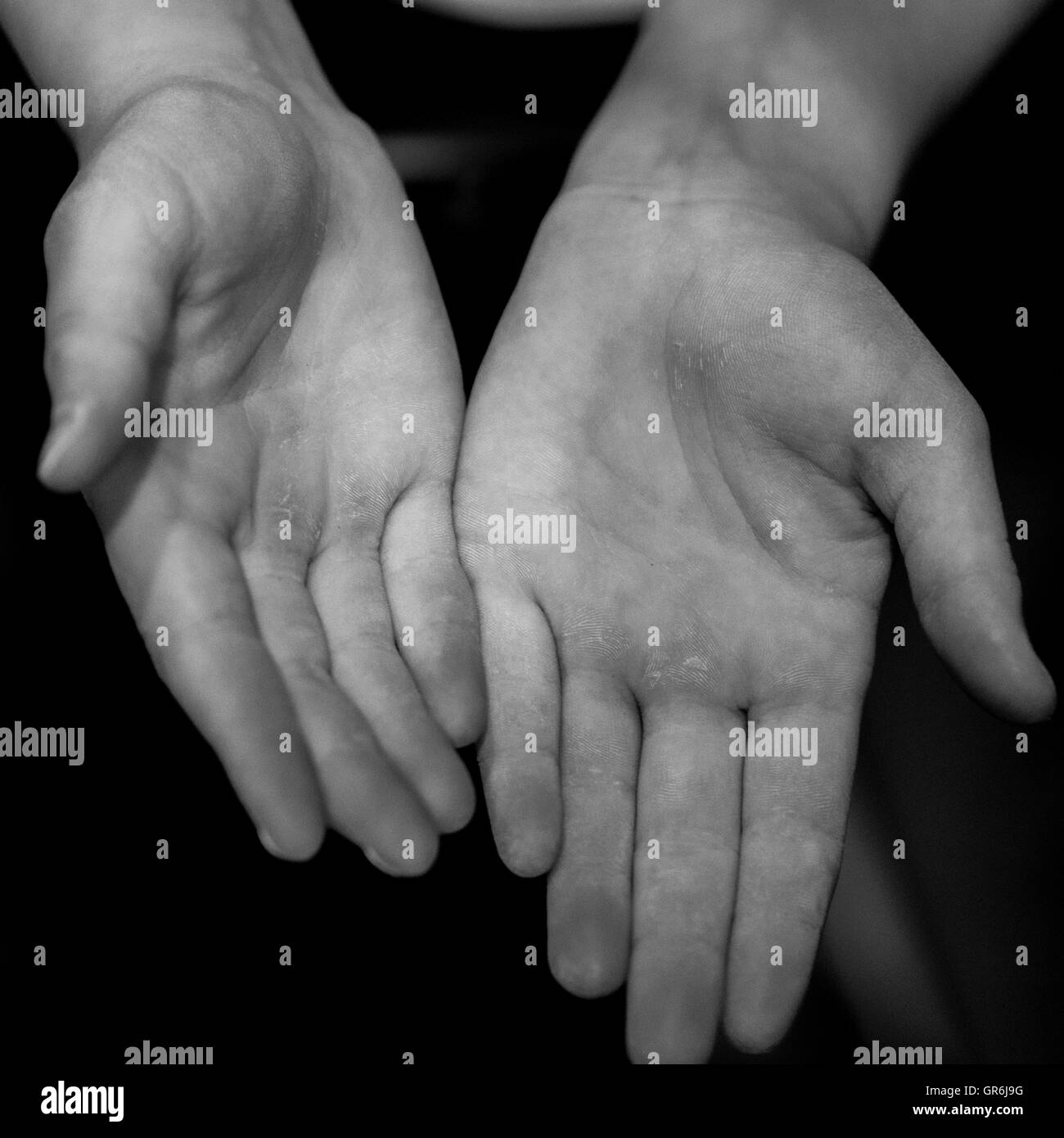 Dirty hands in black and white Stock Photo