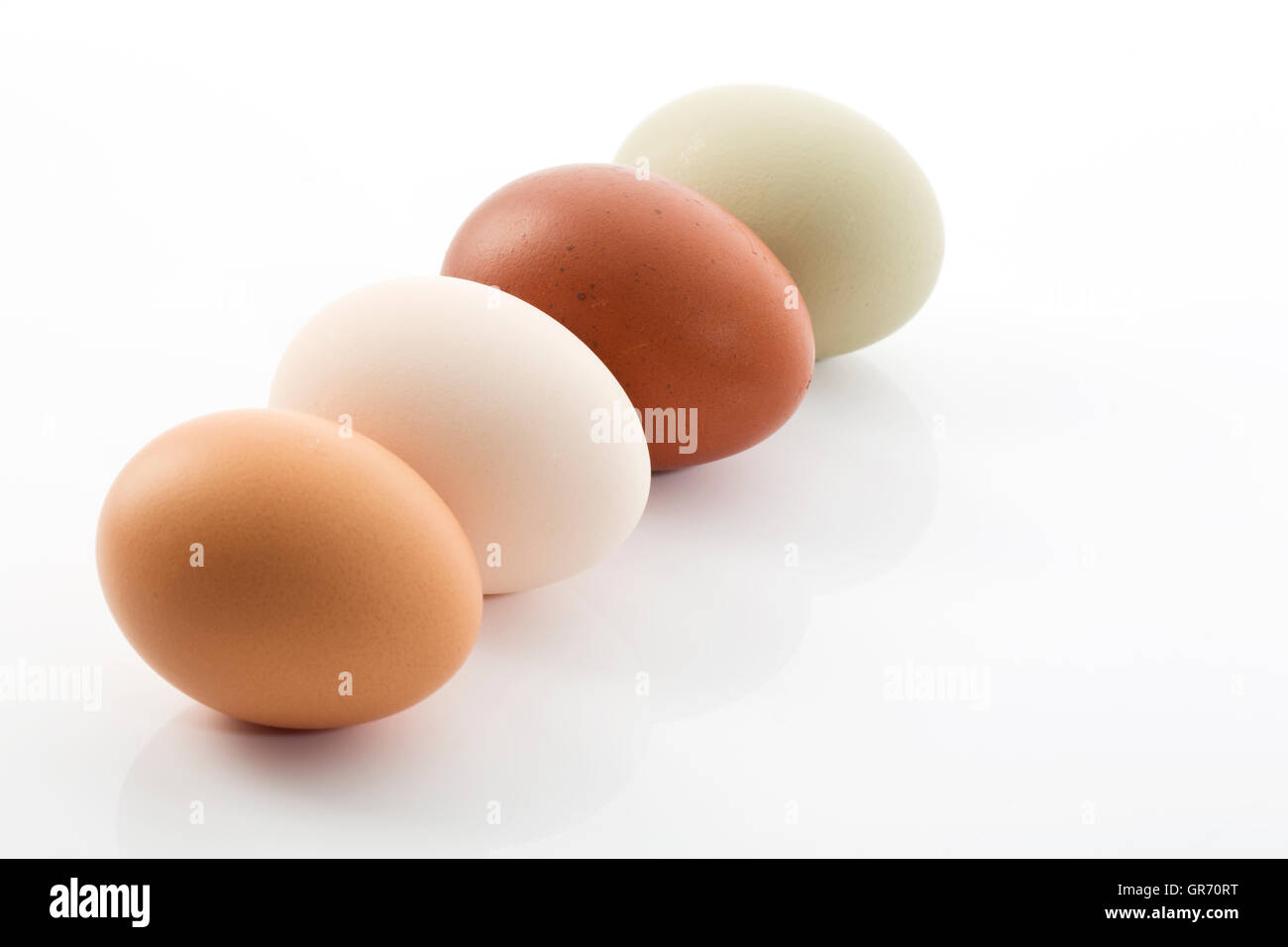 Four Eggs In A Row Stock Photo