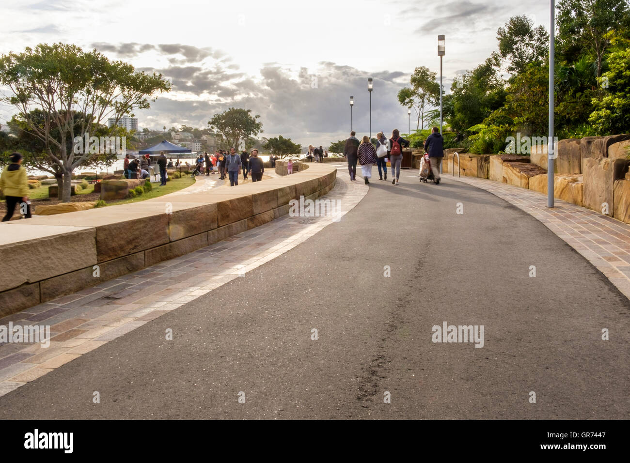 People walking along paths at Barangaroo Reserve, Sydney, New South Wales, Australia Stock Photo