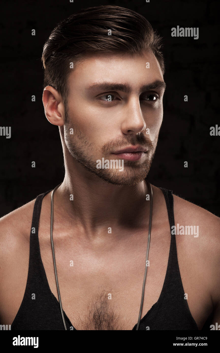 handsome white muscular man isolated on black background Stock Photo