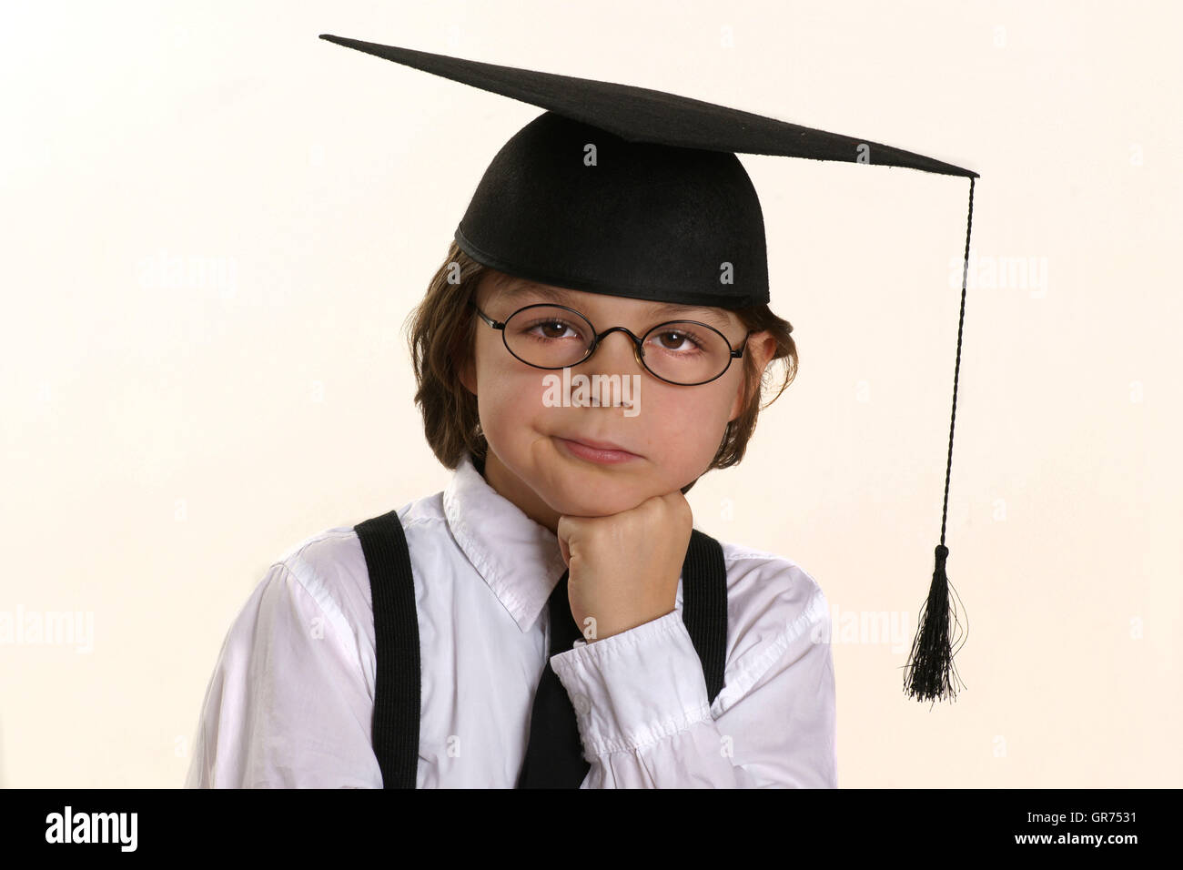 Little Boy With Mortarboard And Diplom Stock Photo