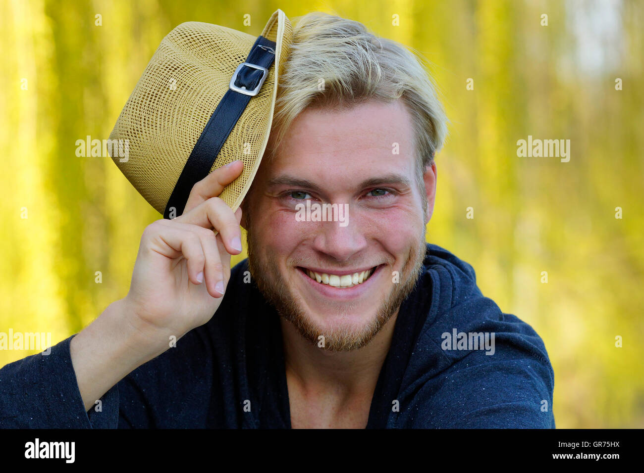 Positive man in hat hi-res stock photography and images - Alamy