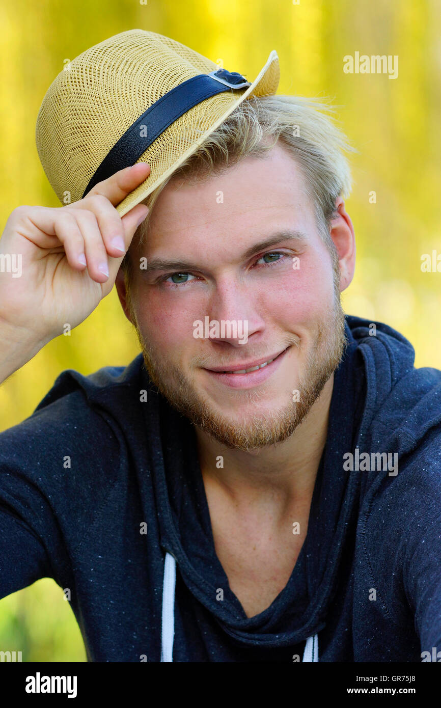 Young man hat hi-res stock photography and images - Alamy