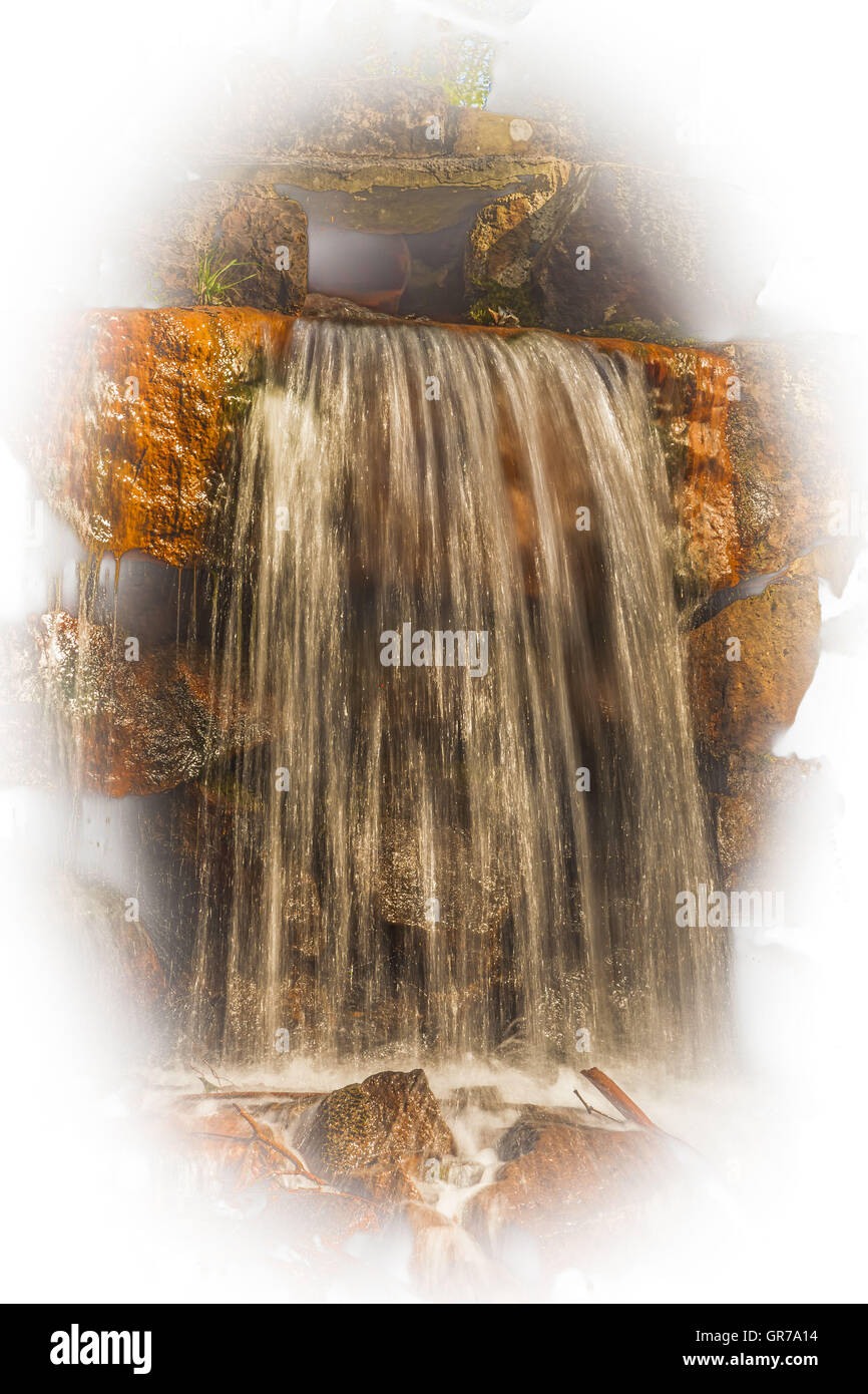 Waterfall At The Casino Park In Spring, Georgsmarienhuette, Osnabrueck Country, Lower Saxony, Germany Stock Photo