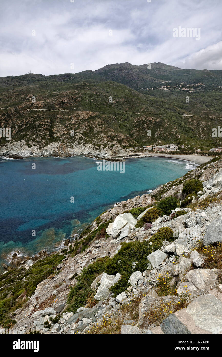 Marine De Giottani, Cap Corse, Gravel Beach At The West Coast With A Little Harbor And The Small Hotel, Corsica, France Stock Photo