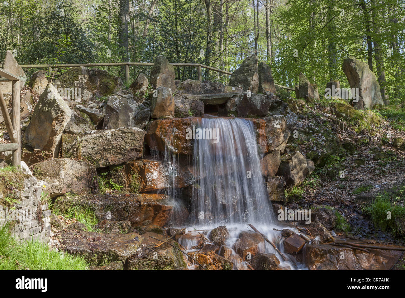 Waterfall At The Casino Park In Spring, Georgsmarienhuette, Osnabrueck Country, Lower Saxony, Germany Stock Photo