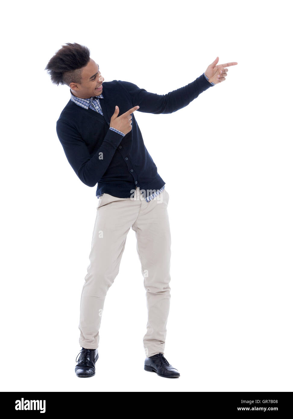 Handsome young african man standing in a comic position at camera Stock ...