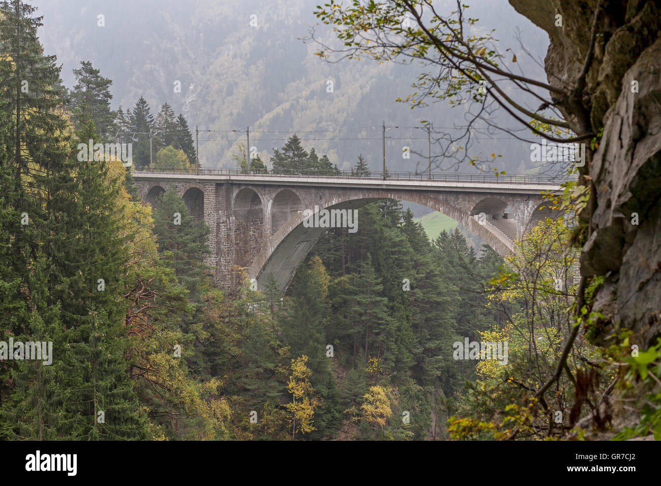 Over Numerous Bridges And Tunnels The The Gotthard Railway Overcomes The Main Ridge Of The Swiss Alps Stock Photo